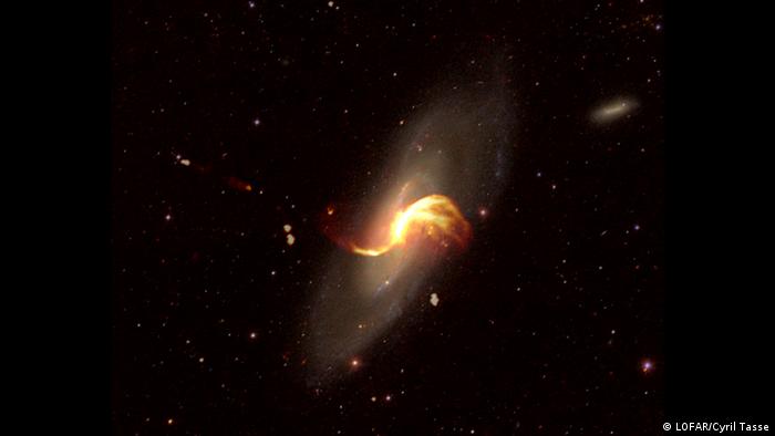 The bright radio structures in the centre of the galaxy are not actually true spiral arms, but are believed to be the result of activity from the galaxy's central supermassive black hole.