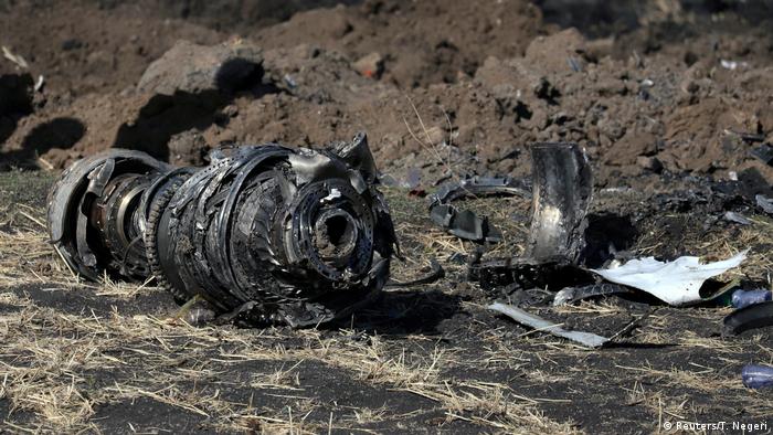 Engine parts are seen at the scene of the Ethiopian Airlines Flight ET 302 plane crash, near the town of Bishoftu, southeast of Addis Ababa, Ethiopia