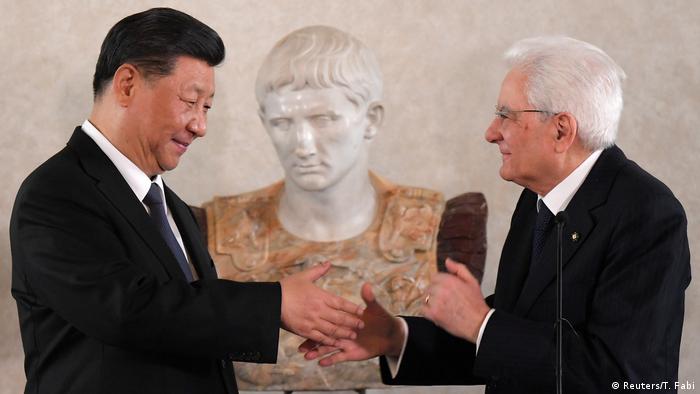 Chinese President Xi Jinping shakes hands witht Italian President Sergio Mattarella in Rome in March 2019