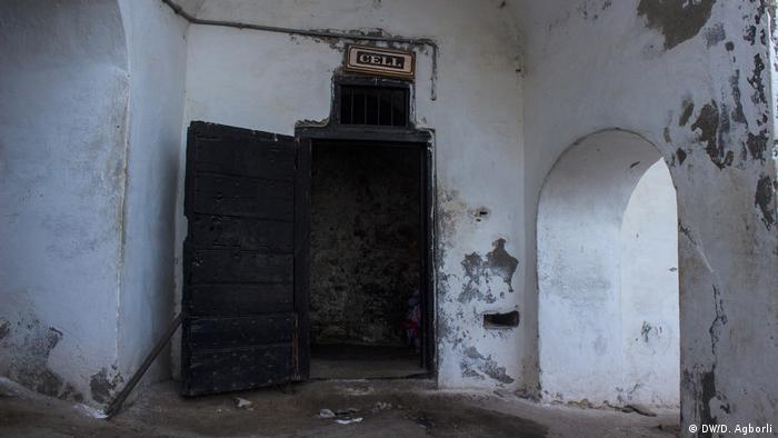 View of the entry to the condemned cells showing the dark room beyond (DW/D. Agborli)
