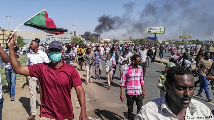 Protesters rally in the Sudanese capital Khartoum against President Omar al-Bashir's government