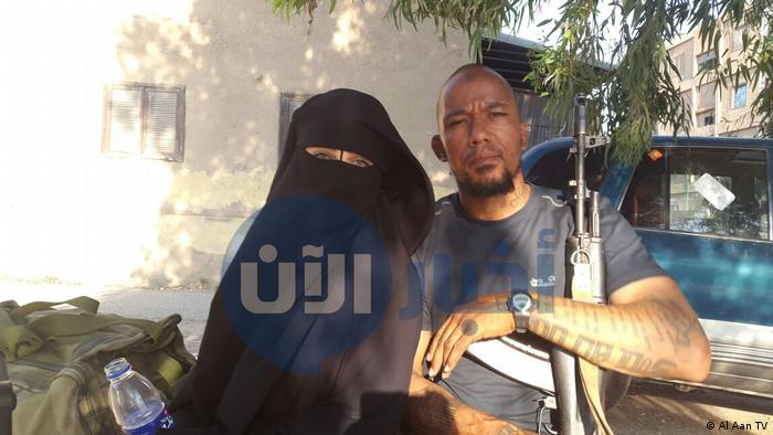 This picture supposedly shows Omaima A with Dennis Cuspert inside IS territory. (Al Aan TV)