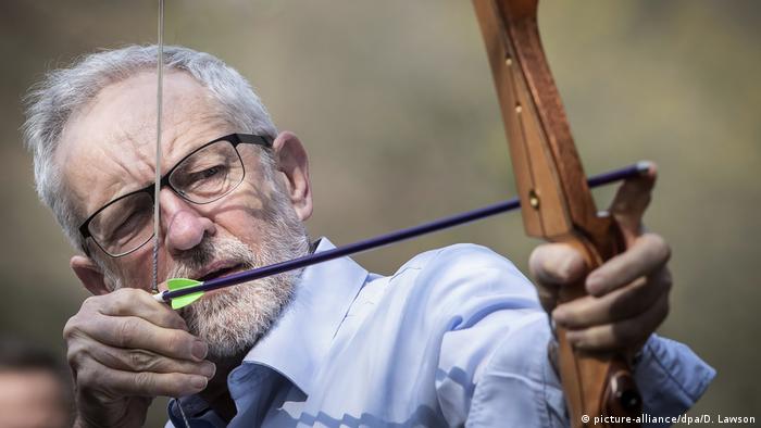 Labour leader Jeremy Corbyn using a bow and arrow in Calderdale