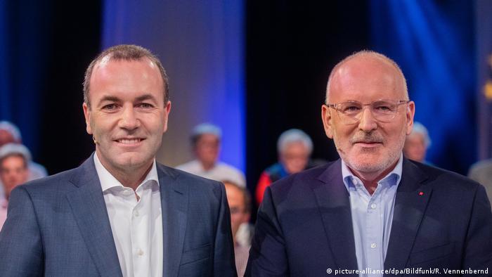 Manfred Weber (PPE, în stânga imaginii) și Frans Timmermans (PES) (picture-alliance/dpa/Bildfunk/R. Vennenbernd)
