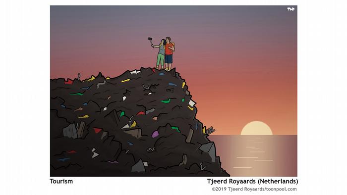 A couple standing on a mountain of trash, taking a selfie in front of a sunset over the ocean (Image: Tjeerd Royaards)