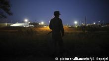 Mexiko, Matamoros: Grenzpolizist (picture-alliance/AP/E. Espejel)