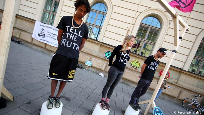 Ice on the rope activists at a protest in Munich