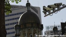 Las cámaras de vigilancia son ubicuas en Urumchi. (Getty Images/AFP/P. Parks)