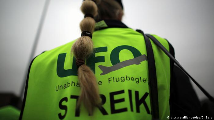 An German airline worker is seen striking in October. Dpa