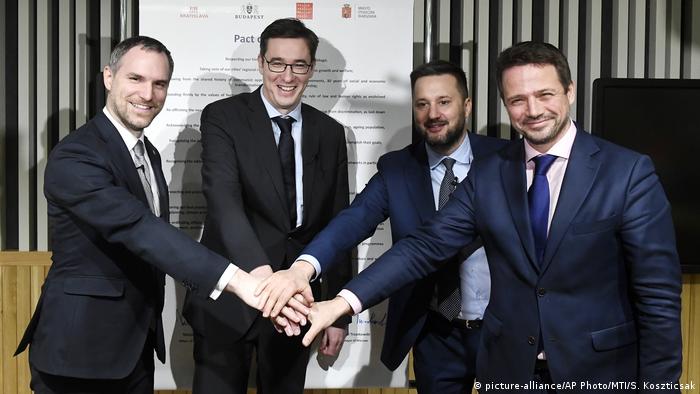 The mayors of Prague, Budapest, Bratislava and Warsaw pose for a photo
