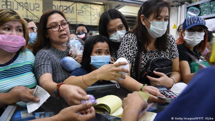 People buy protective masks in the Philippines