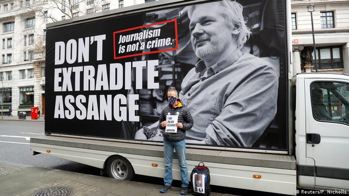 A protester in London demonstrating against extradition of Julian Assange (Reuters/P. Nicholls)