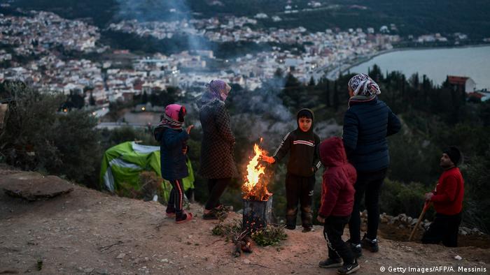 Family of asylum seekers at refugee camp in Greece (Getty Images/AFP/A. Messinis)