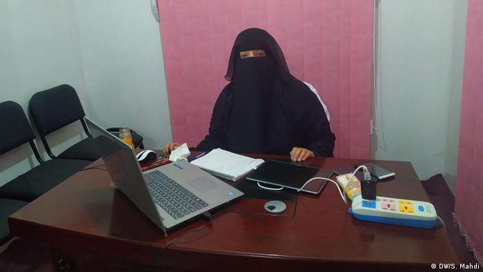 A psychiatrist in Yemen at her desk