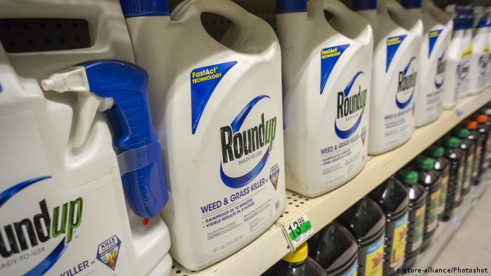 Containers of Roundup on supermarket shelves