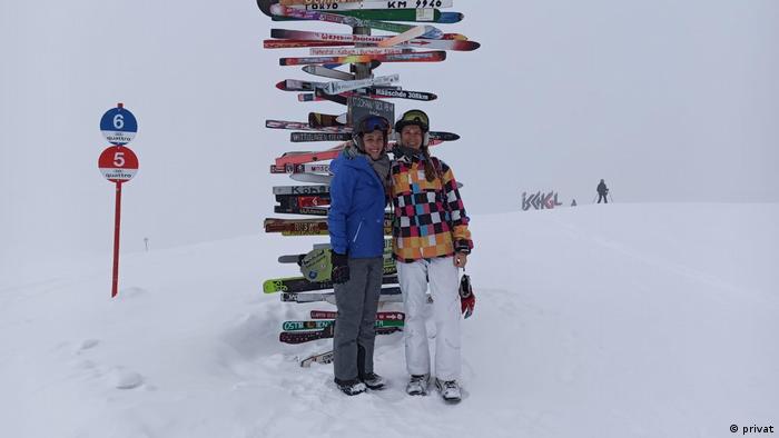 A German ski tourist with her daughter