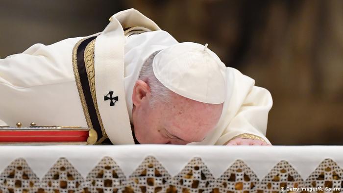 Pope Francis kisses the altar at the start of Easter Sunday Mass (Getty Images/A. Solaro)