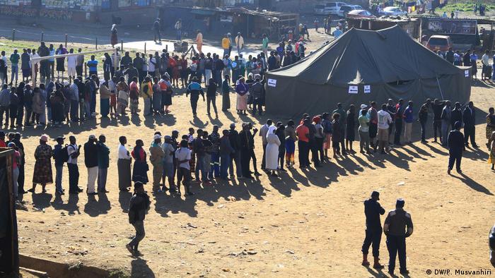 People line up to vote in Zimbabwe's elections 