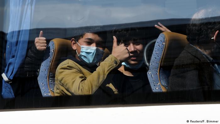 refugee children sitting in bus (Reuters/F. Bimmer)