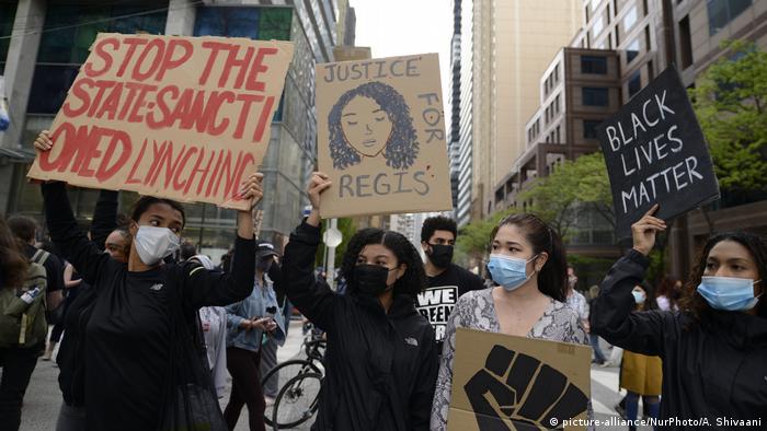 Protesters chanting Justice for Regis during a rally to protest the police involved deaths in North America