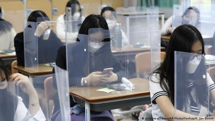 Guidelines mandate that desks are placed in a manner that allows for physical distancing. In many cases, schools are putting up partitions to prevent the spread of the virus. South Korea has seen a resurgence of cases linked to gatherings at night clubs, churches and warehouses in recent days. This has led to the imposition of stricter regulations.