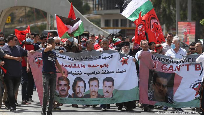 A group of Palestinians gather to protest the Israel's annexation plan of the Jordan Valley