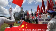 Hongkong Pro-Chinesische Demonstranten feiern das neue Sicherheitsgestz