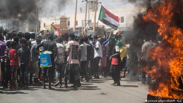 Waving Sudanese flags, protesters gathered in Khartoum and its twin cities Khartoum North and Omdurman