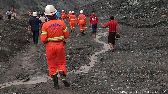 Rescue officials at the site of a mine disaster in Myanmar
