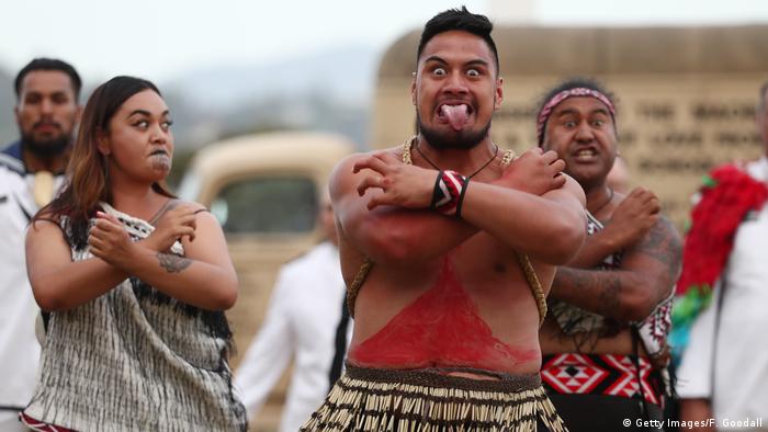Local iwi perform a haka during an evening to commemorate Maori service in the NZ armed forces